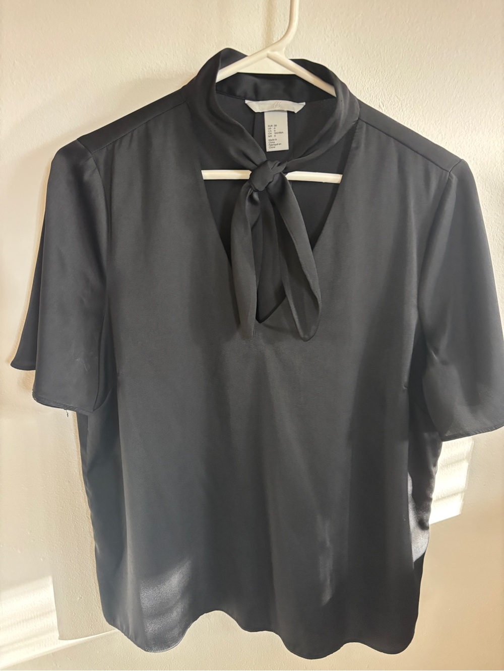 H&M black v neck tie neck blouse